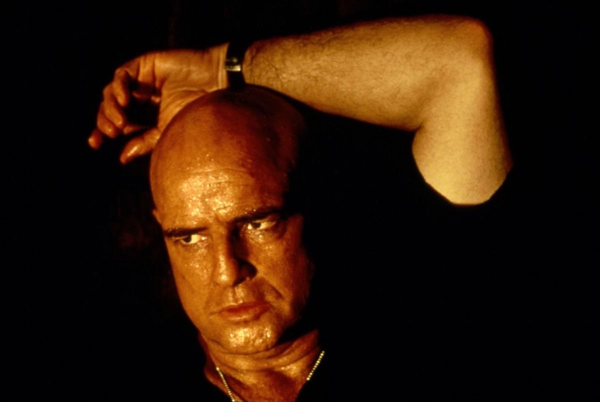 Image of a bald Marlon Brando in Apocalypse Now.